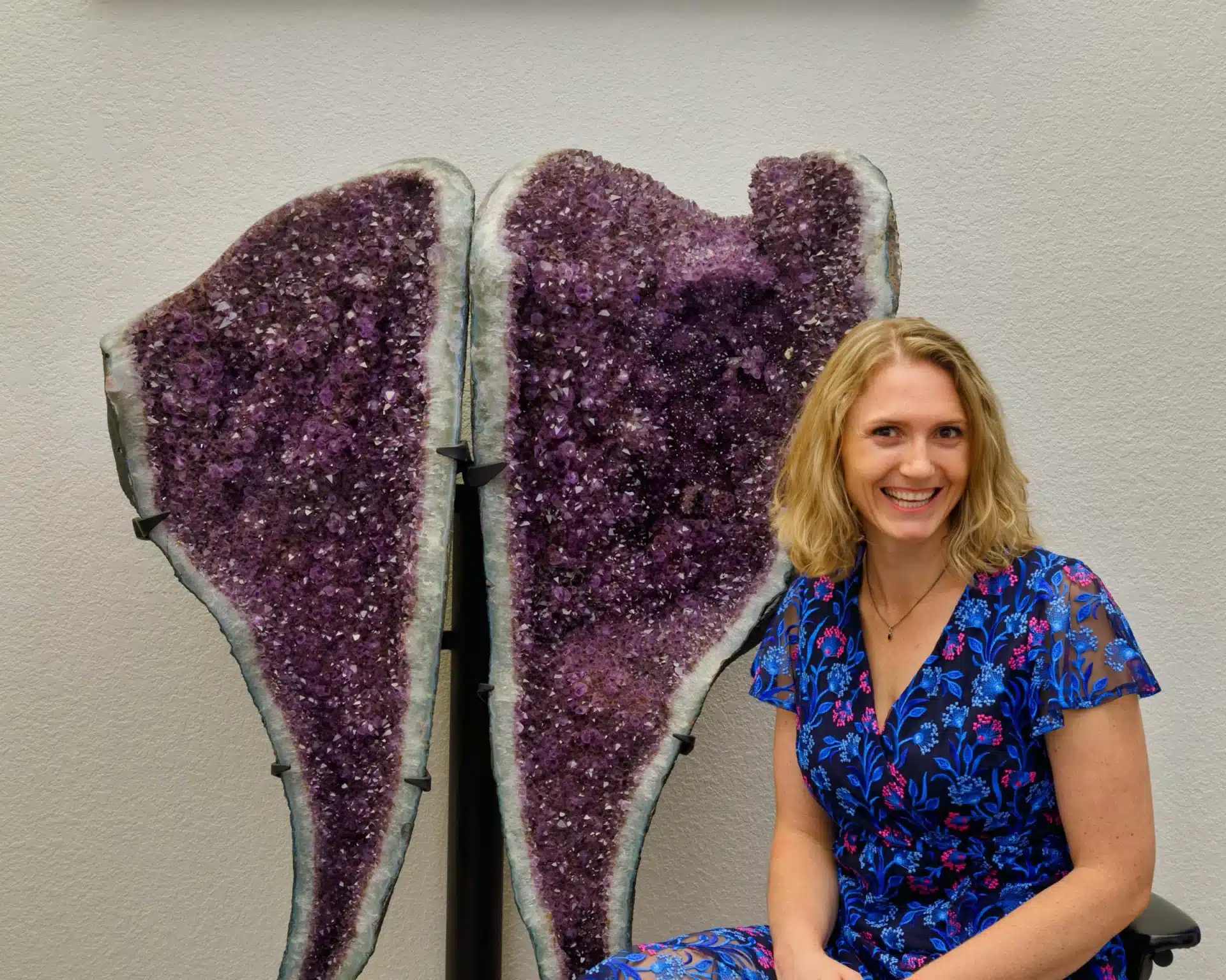 Amanda portrait in front of amethyst crystals